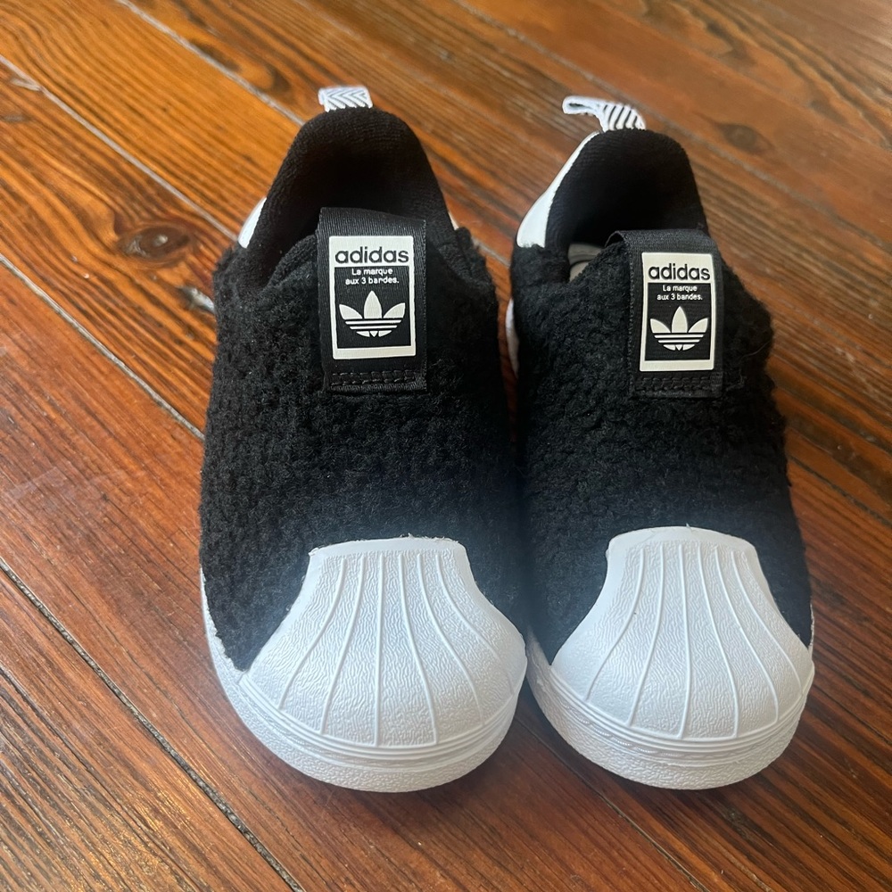 Adidas Black and White Slip-On Sneakers